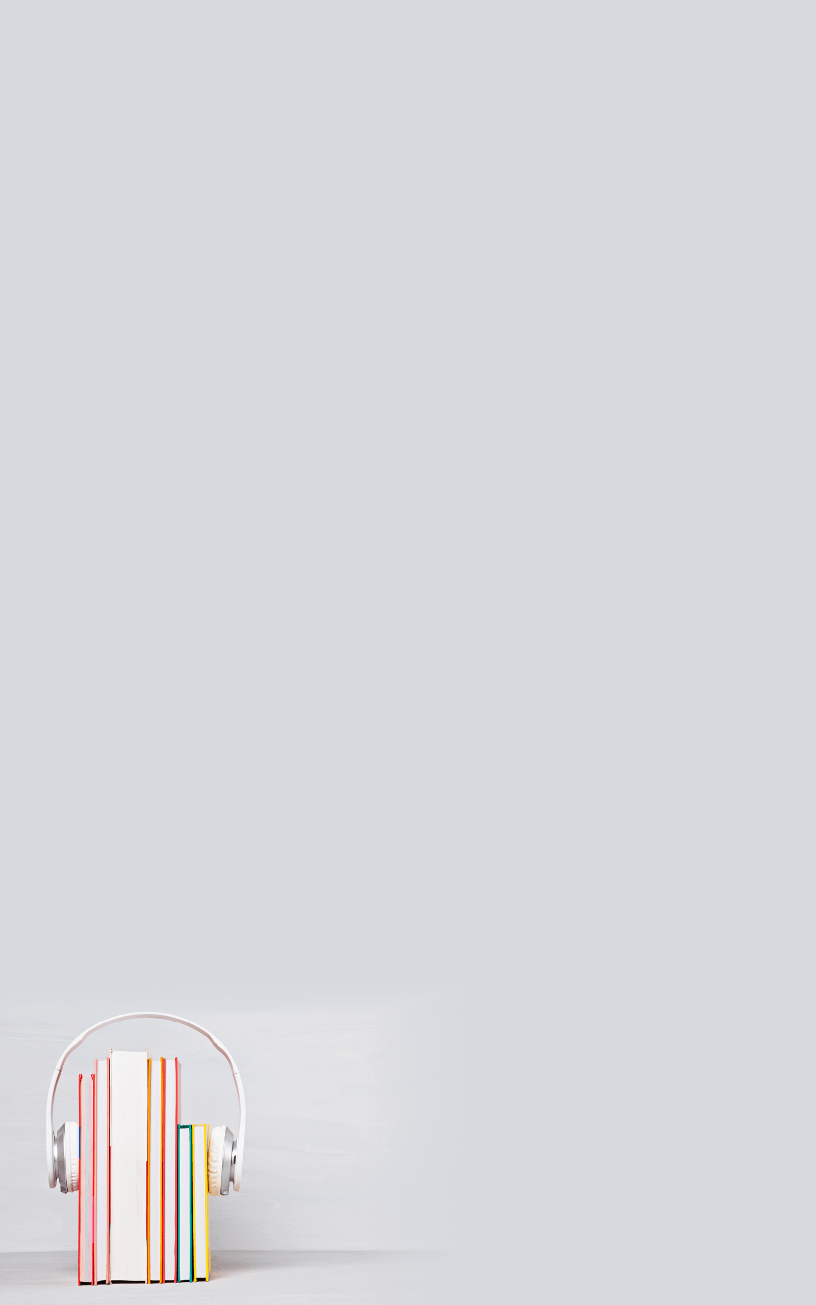 Group of books with the earphones. Audiobooks. Listen and study concept.