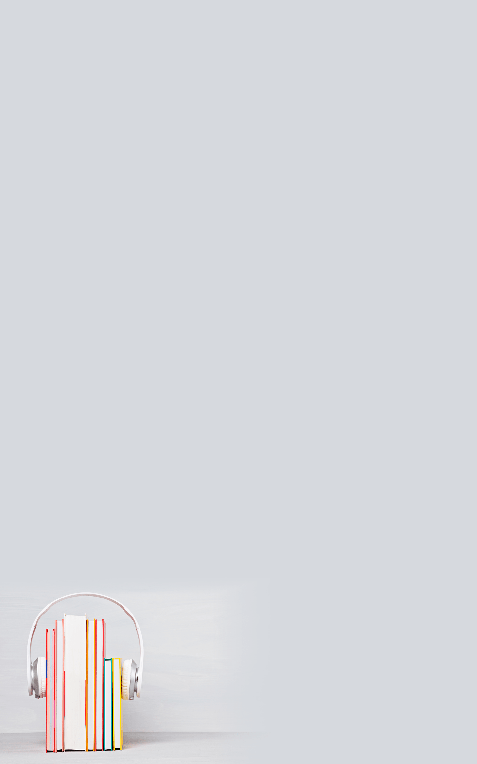 Group of books with the earphones. Audiobooks. Listen and study concept.